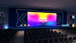 Plenária do evento Danone com visualização 3D no Tauá Hotel, mostrando palco e assentos.